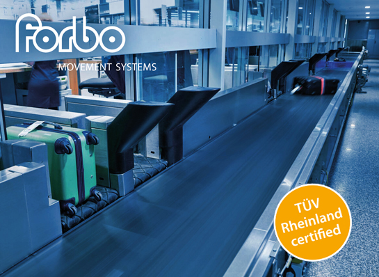Luggage on a conveyor belt and the forbo logo in the top left corner