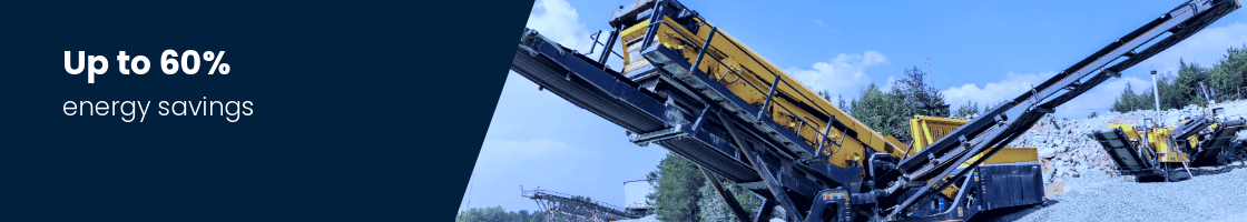 Large construction machine on gravel surface with raised conveyor belt