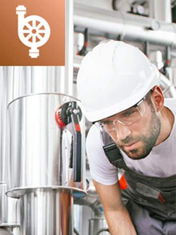 Man with safety helmet checking something and a pump icon in the upper left corner